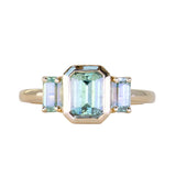 1.29ct Bezel Set Emerald Cut Untreated Montana Sapphire and Montana Sapphire Sides Three Stone Ring in 14k Yellow Gold