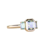 1.29ct Bezel Set Emerald Cut Untreated Montana Sapphire and Montana Sapphire Sides Three Stone Ring in 14k Yellow Gold