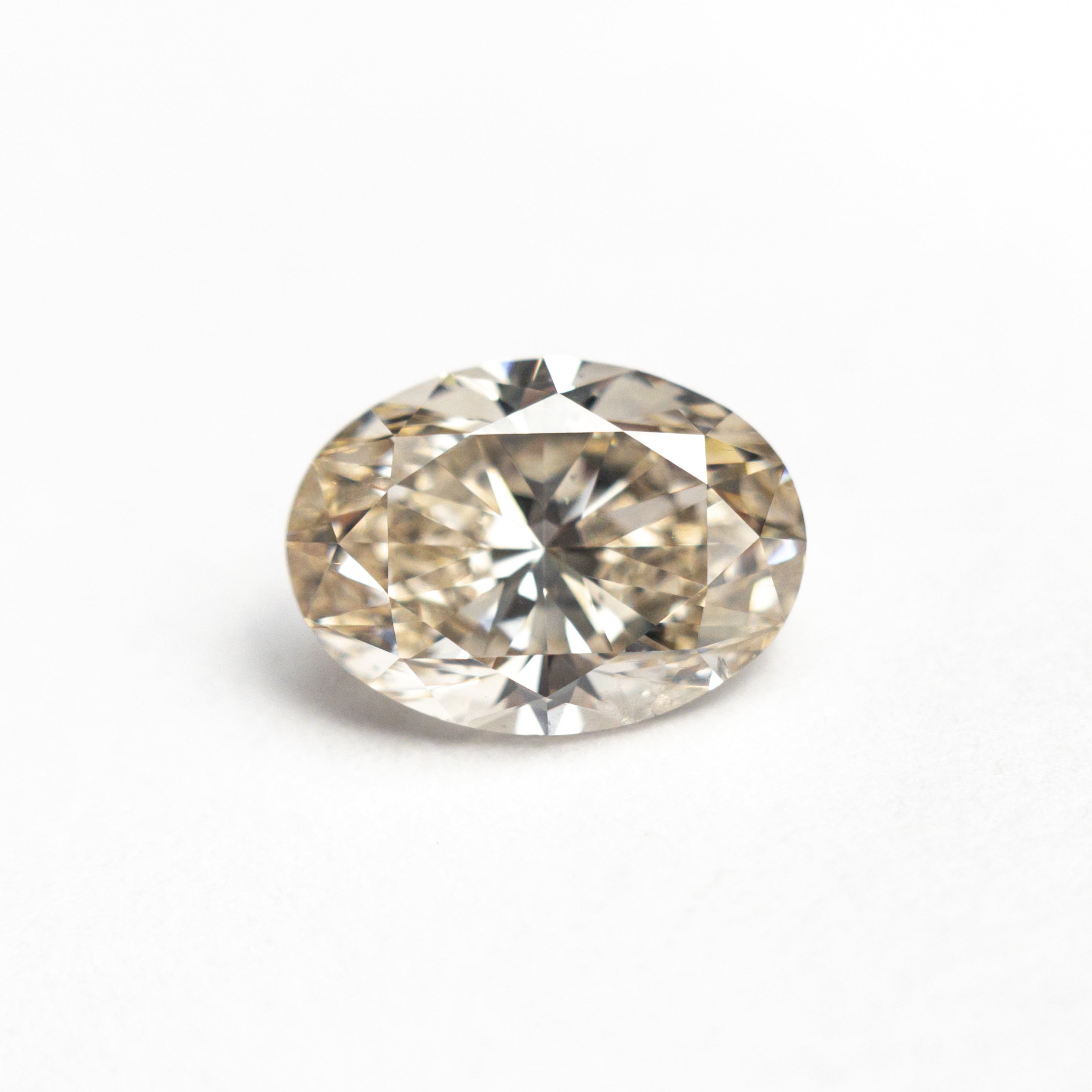 1.54ct 8.65x6.26x4.18mm SI1 C3 Oval Brilliant 27085-01 – Anueva Jewelry