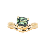 1.65ct Emerald Cut Color Shifting Madagascar Sapphire Prong Set Ripple Contour Solitaire in 14k Yellow Gold