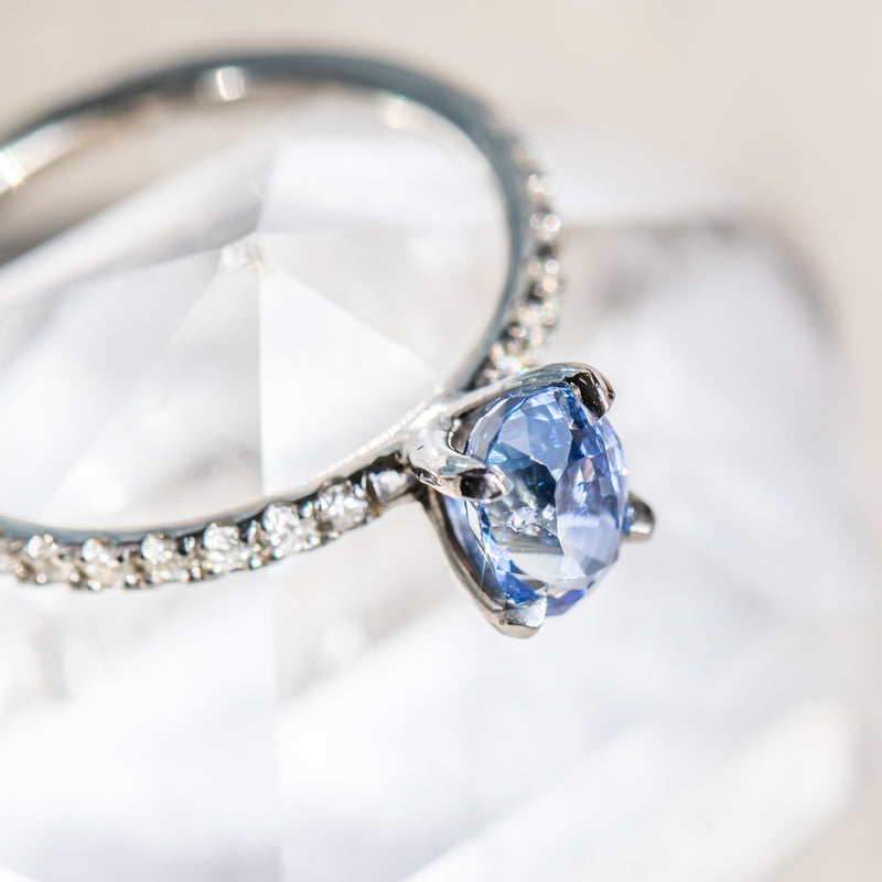 1.12ct Oval Periwinkle Blue Sapphire Solitaire with French Set Diamonds In 14K White Gold