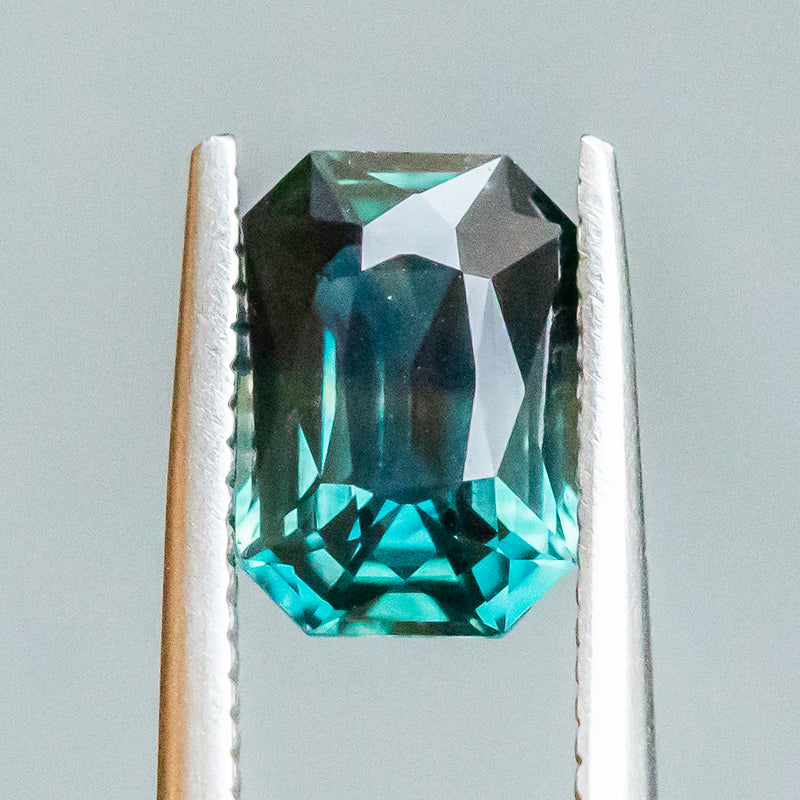 3.07CT EMERALD CUT MADAGASCAR SAPPHIRE, DEEP TEAL WITH COLOR BANDING, 9.36X6.55X4.83MM