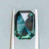 3.07CT EMERALD CUT MADAGASCAR SAPPHIRE, DEEP TEAL WITH COLOR BANDING, 9.36X6.55X4.83MM