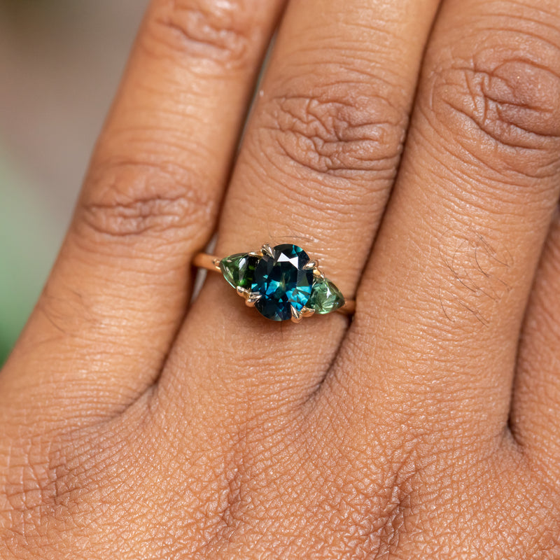 1.63ct Oval African Teal Blue Sapphire and Tourmaline Cabochon Trillion Three Stone Ring in 14K Yellow Gold
