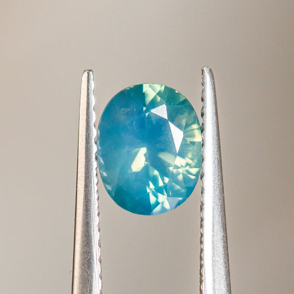 1.30CT OVAL GOMBE NIGERIAN SAPPHIRE, SILKY OPALESCENCE TEAL, 6.98X5.66X4.02MM, UNHEATED