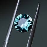 1.41CT ROUND SONGEAN SAPPHIRE, COLOR SHIFTING BLUE GREEN PURPLE, 7.1X4MM