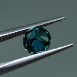 1.60CT ROUND NIGERIAN SAPPHIRE, UNTREATED, DEEP TEAL BLUE GREEN, 6.8X4.6MM