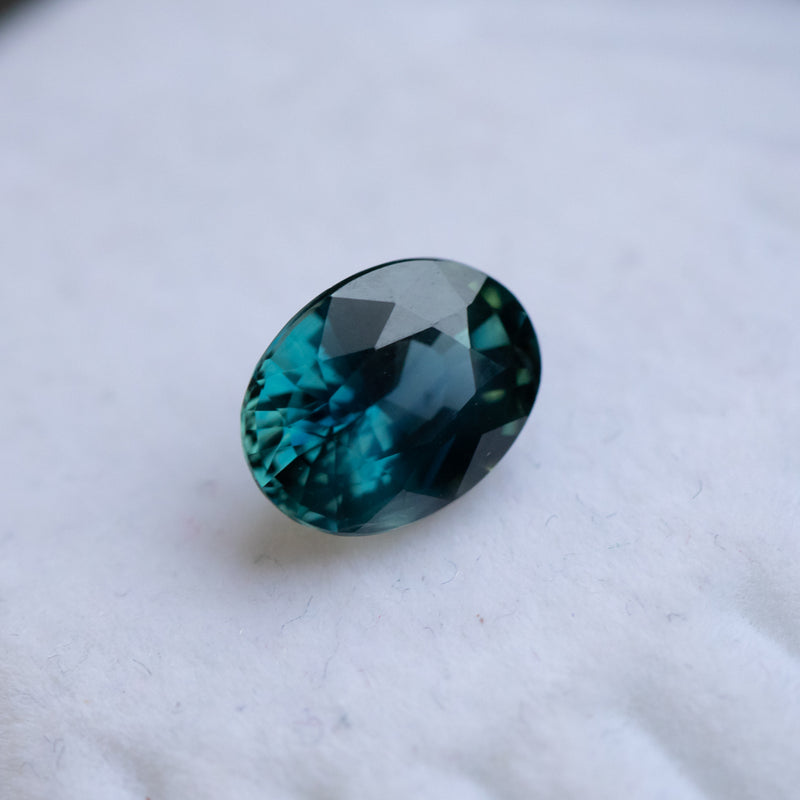 2.58CT OVAL MADAGASCAR SAPPHIRE, DEEP TEAL WITH GREEN, 9X7X4.9MM, UNTREATED