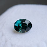 3.59CT OVAL MADAGASCAR SAPPHIRE, DEEP TEAL WITH GREEN, 9X7X4.9MM