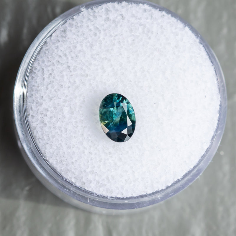 0.92CT OVAL NIGERIAN SAPPHIRE, TEAL PARTI GREEN, 7.01X5.01X3.27MM, UNTREATED