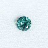 1.46CT ROUND TANZANIAN SAPPHIRE, TEAL GREEN, 6.65X6.65X4.10MM, UNTREATED