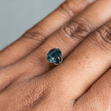 1.59CT ROUND NIGERIAN SAPPHIRE, DEEP TEAL WITH PARTI GREEN, 7.00X4.34MM, UNTREATED