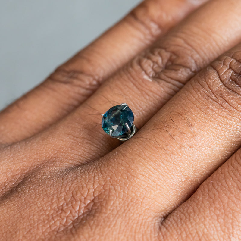 1.59CT ROUND NIGERIAN SAPPHIRE, DEEP TEAL WITH PARTI GREEN, 7.00X4.34MM, UNTREATED