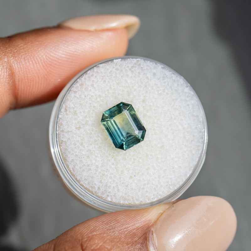 2.15CT EMERALD CUT MADAGASCAR SAPPHIRE, PARTI TEAL GREEN WITH YELLOW FLASHES, 8.22X6.58X3.73MM, UNTREATED