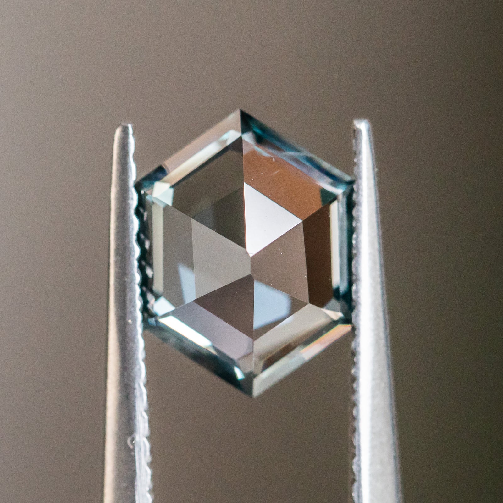 1.91CT HEXAGON MOZAMBIQUE SPINEL, GREY WITH PURPLE, 9.3X7.2MM