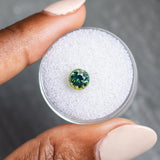 1.29CT ROUND MADAGASCAR SAPPHIRE, PARTI GREEN WITH LIGHT TEAL FLASHES, 6.2MM