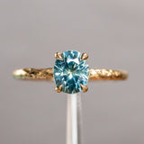 1.63ct Oval Montana Sapphire Evergreen Carved Solitaire in 18k Yellow Gold