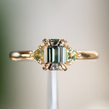 1.56ct Emerald Cut Tanzanian Sapphire and Parti Sapphire Shield Three Stone Ring in 14k Yellow Gold