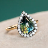 3.83ct Pear Cabochon Australian Sapphire and Blackened Halo ring in 18k Yellow Gold