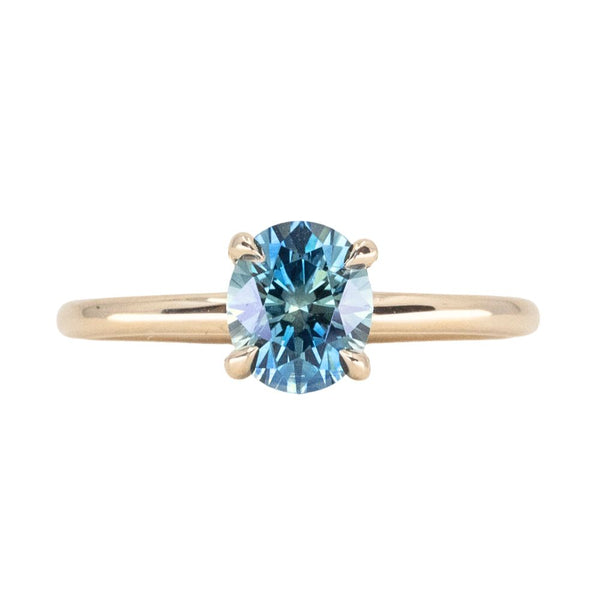 1.32ct Precision Cut Oval Teal Montana Sapphire Classic 4 Prong Solitaire in 14k Yellow Gold