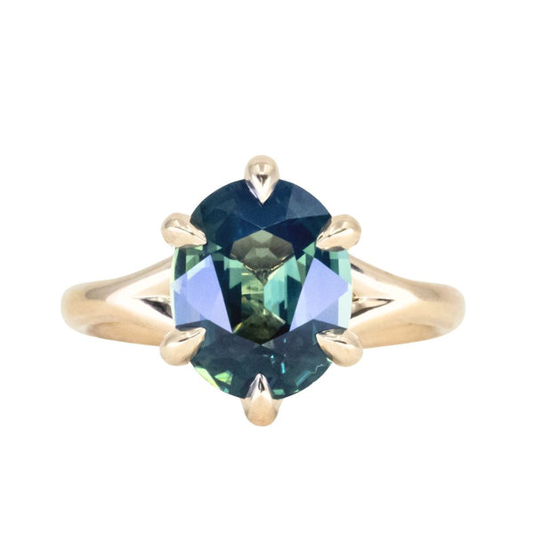 4.07ct Oval Deep Teal Sapphire Low Profile Six Prong Split Shank Solitaire in 14k Yellow Gold