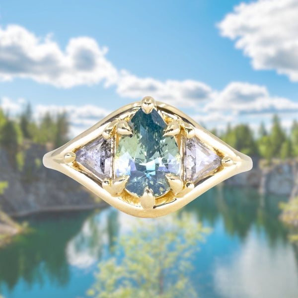 2.07ct Untreated Glowy Teal Madagascar Pear Sapphire and Trillion Grey Diamonds Low Profile Three Stone Ring in 18k Yellow Gold