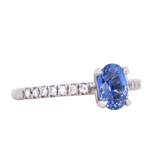 1.12ct Oval Periwinkle Blue Sapphire Solitaire with French Set Diamonds In 14K White Gold