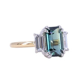 3.05ct Teal Emerald Cut Sapphire Three Stone Ring with Baguette Diamonds in Platinum & 18k Yellow Gold