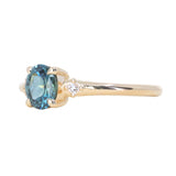 0.85ct Oval Deep Teal Montana Sapphire and Princess Cut Diamond Rapids Low Profile Ring in 14k Yellow Gold