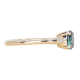 0.85ct Oval Deep Teal Montana Sapphire and Princess Cut Diamond Rapids Low Profile Ring in 14k Yellow Gold