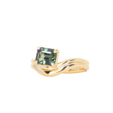 1.65ct Emerald Cut Color Shifting Madagascar Sapphire Prong Set Ripple Contour Solitaire in 14k Yellow Gold