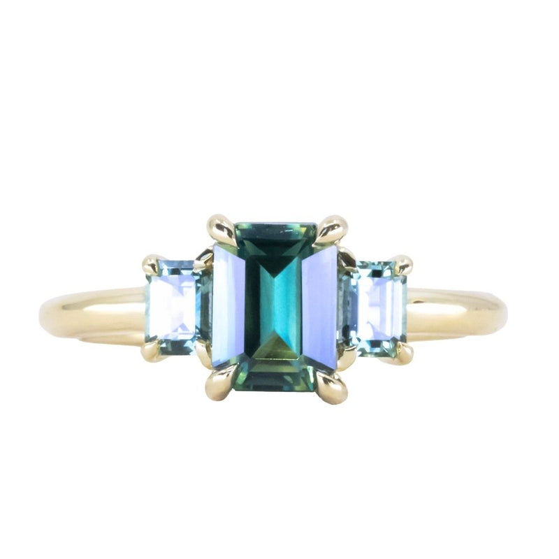 1.30ct Emerald Cut Madagascar Sapphire and  0.98ctw Montana Sapphire Three Stone Low Profile Ring in 18k Yellow Gold