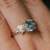 2.38ct Untreated Sky Blue Montana Sapphire in Wandering Vine Low Profile Four Prong Setting with Natural Diamonds in 14k Yellow Gold- Appraised Stone