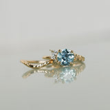 2.38ct Untreated Sky Blue Montana Sapphire in Wandering Vine Low Profile Four Prong Setting with Natural Diamonds in 14k Yellow Gold- Appraised Stone