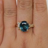 4.42ct Oval Blue Madagascar Sapphire in Wandering Vine Low Profile 4 Prong Setting with Diamonds in 14k Yellow Gold