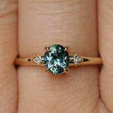 0.90ct Oval Light Blue Green Montana Sapphire and Princess Cut Diamond Rapids Low Profile Ring in 14k Yellow Gold