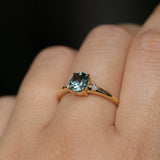 0.90ct Oval Light Blue Green Montana Sapphire and Princess Cut Diamond Rapids Low Profile Ring in 14k Yellow Gold