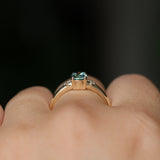 0.90ct Oval Light Blue Green Montana Sapphire and Princess Cut Diamond Rapids Low Profile Ring in 14k Yellow Gold