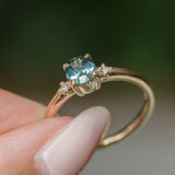 0.90ct Oval Light Blue Green Montana Sapphire and Princess Cut Diamond Rapids Low Profile Ring in 14k Yellow Gold