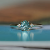 0.90ct Oval Light Blue Green Montana Sapphire and Princess Cut Diamond Rapids Low Profile Ring in 14k Yellow Gold