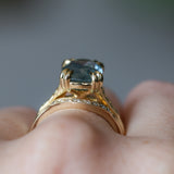 4.25ct Antique Style Elongated Cushion Untreated Montana Sapphire Vine Cathedral Four Prong Ring in 18k Yellow Gold