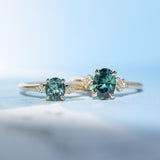 0.90ct Oval Light Blue Green Montana Sapphire and Princess Cut Diamond Rapids Low Profile Ring in 14k Yellow Gold