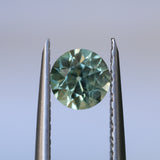 0.85CT ROUND PRECISION CUT MONTANA SAPPHIRE, LIGHT GREEN YELLOW, 5.55X3.70MM