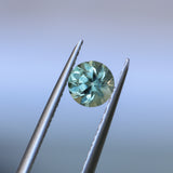 0.85CT ROUND PRECISION CUT MONTANA SAPPHIRE, LIGHT GREEN YELLOW, 5.55X3.70MM