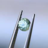 0.85CT ROUND PRECISION CUT MONTANA SAPPHIRE, LIGHT GREEN YELLOW, 5.55X3.70MM