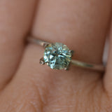 0.85CT ROUND PRECISION CUT MONTANA SAPPHIRE, LIGHT GREEN YELLOW, 5.55X3.70MM