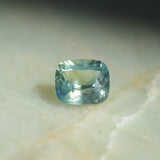 1.53CT ELONGATED CUSHION MADAGASCAR SAPPHIRE, LIGHT SEAFOAM TEAL AND YELLOW, UNTREATED, 7.3X5.8X4.1MM