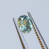 0.65CT OVAL AUSTRALIAN SAPPHIRE, PARTI LIGHT GREEN YELLOW BLUE, UNTREATED, 5.70X4.60X3.30MM