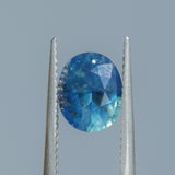 1.80CT OVAL MADAGASCAR SAPPHIRE, OCEAN BLUE TEAL WITH SOME PARTI, 8.2X6.7X4.3MM