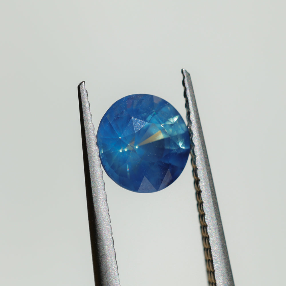 1.51CT ROUND MADAGASCAR SAPPHIRE, DEEP TEAL OPALESCENT, UNTREATED